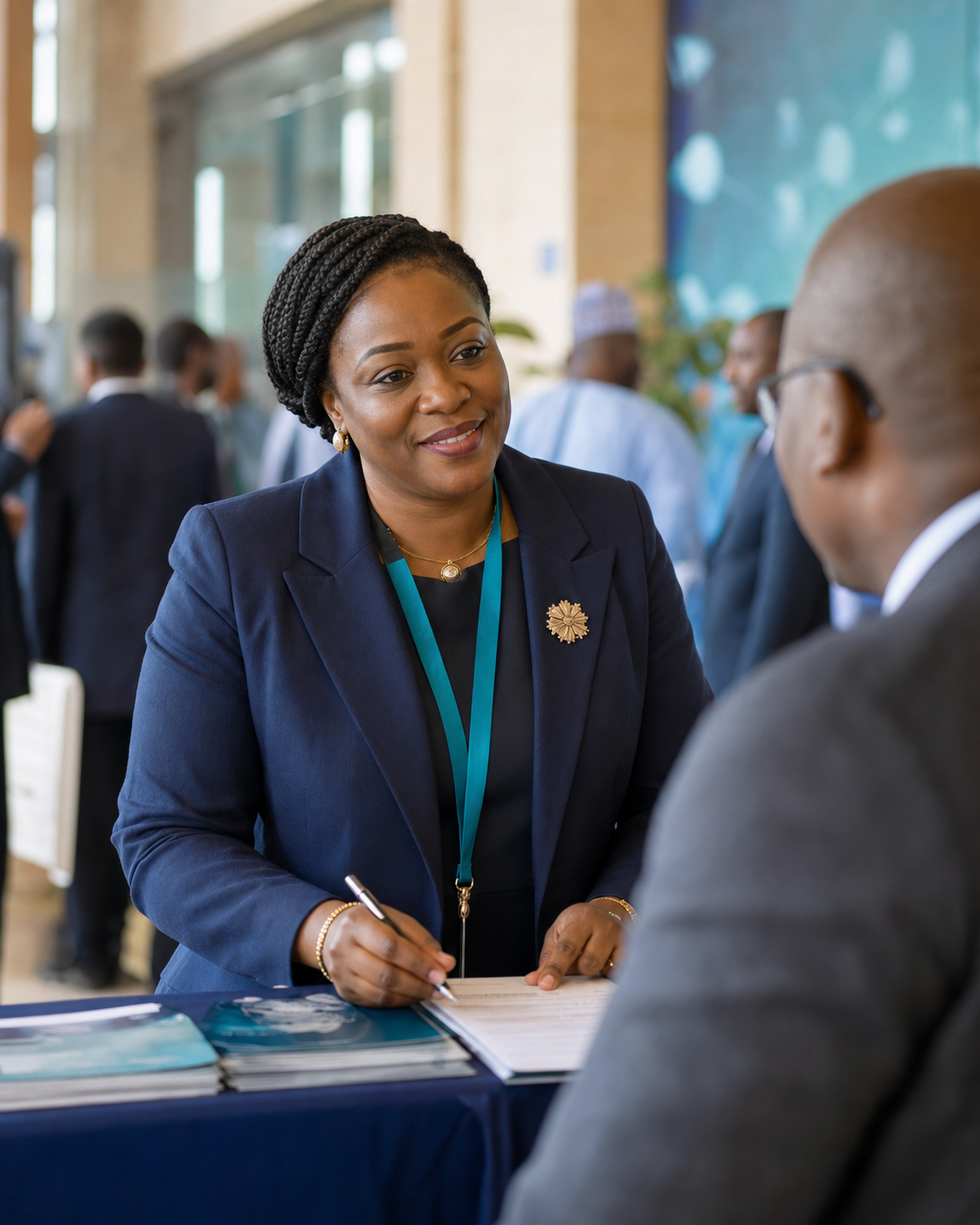 Conference support professional welcoming a delegate